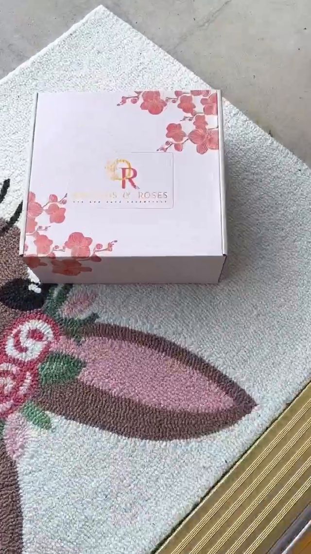 Self-care gift box presented on a patterned rug